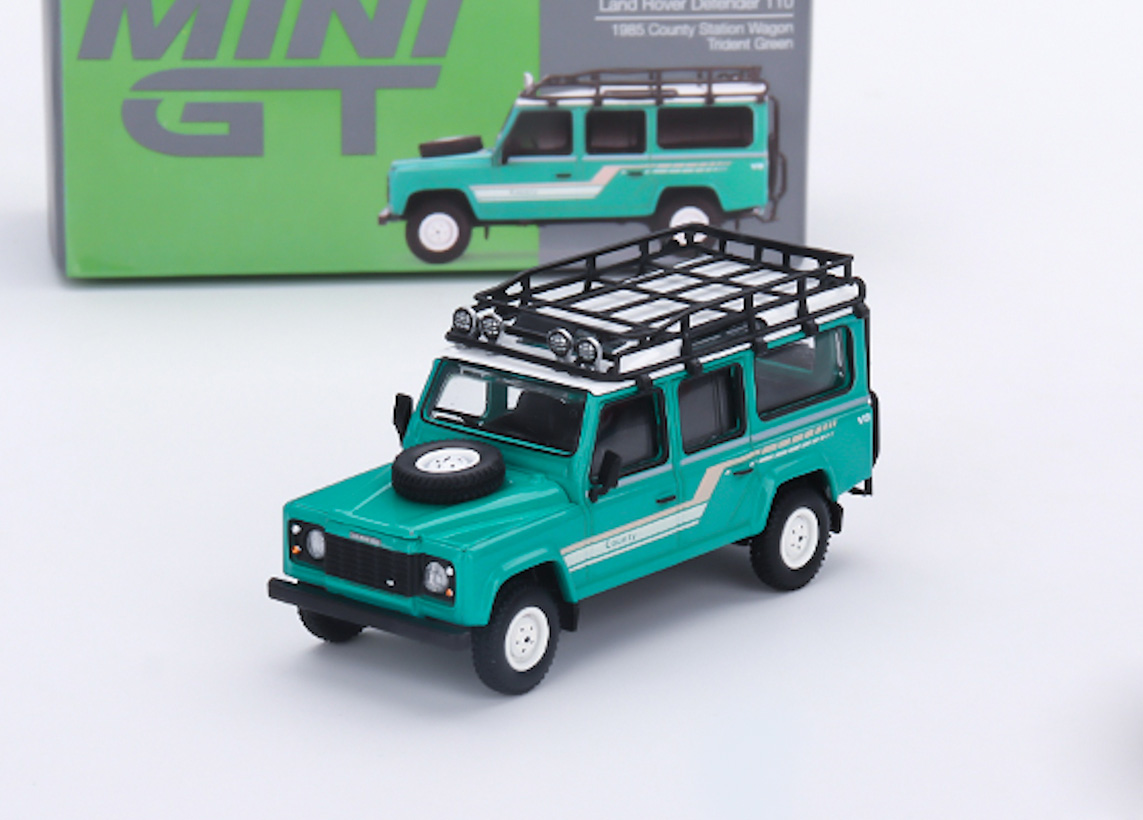 Land Rover Defender 110 1985 County Station Wagon Trident Green - Mini GT 1:64